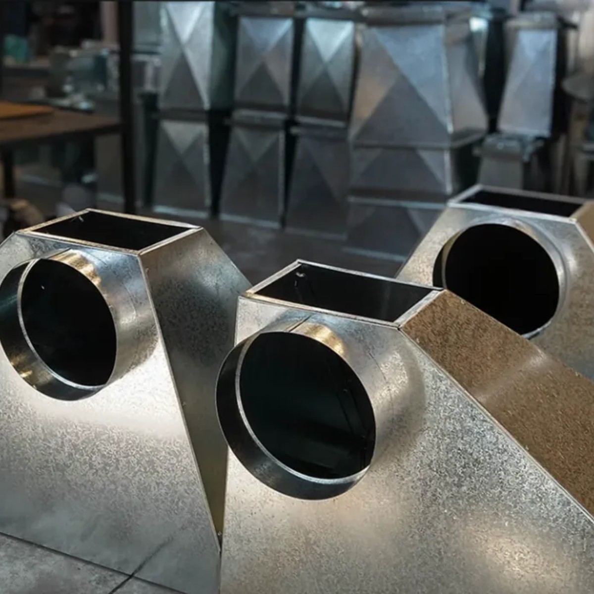 Campanas para parrilla con salida redonda en la fábrica de Rapimetal